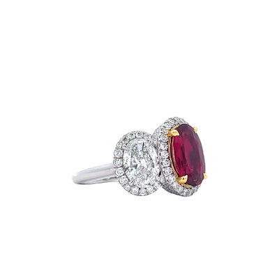 Platinum Three-Stone Ruby (2.18 CT) and Diamond (2 1/7 CT) Pave Set Halo Style Ring