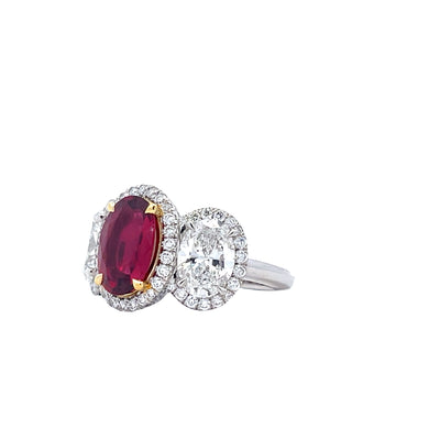 Platinum Three-Stone Ruby (2.18 CT) and Diamond (2 1/7 CT) Pave Set Halo Style Ring