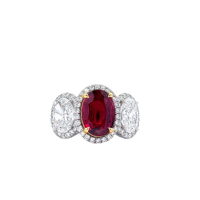 Platinum Three-Stone Ruby (2.18 CT) and Diamond (2 1/7 CT) Pave Set Halo Style Ring